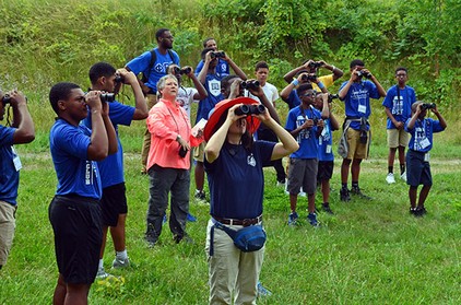 Students using binoculars